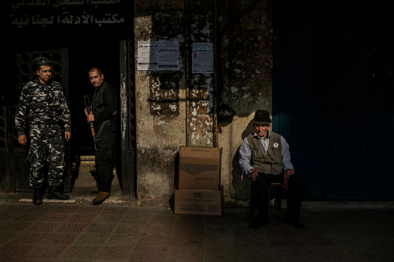 A man watches the clashes from a chair in Tripoli. "There is a lot of tension?in the atmosphere," Ibarra Sánchez said.