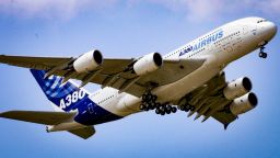 PARIS- JUNE 13:  The worlds largest passenger liner, the Airbus A-380 flies on display at the Paris Air-show June 13, 2005 in the Paris suburb of Le Bourget, France. The Airshow which is held every two years is open to industry and visitors and will be showcasing some exciting new products. (Photo by Pascal Le Segretain/Getty Images)