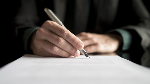 hand writing on paper STOCK