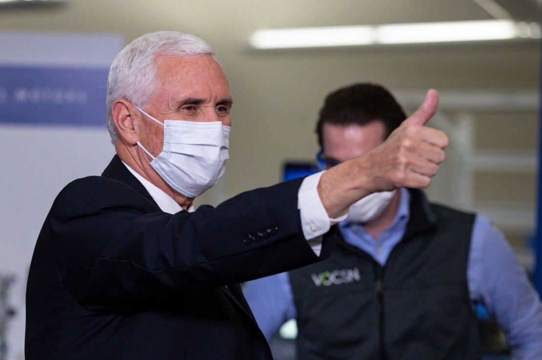 Vice President Mike Pence gestures while visiting the General Motors/Ventec ventilator production facility in Kokomo, Ind., April 30, 2020.