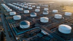 TOPSHOT - Oil-storage tanks are seen from above in Carson, California, April 25, 2020 after the price for crude plunged into negative territory for the first time in history on April 20. - Although oil prices have stabilized somewhat since the unprecedented dive, the world remains in the throes of a glut of crude oil caused by a precipitous fall in demand due to the global coronavirus pandemic coupled with a lack of storage capacity for crude already in transit or still being produced. (Photo by Robyn Beck/AFP/Getty Images)