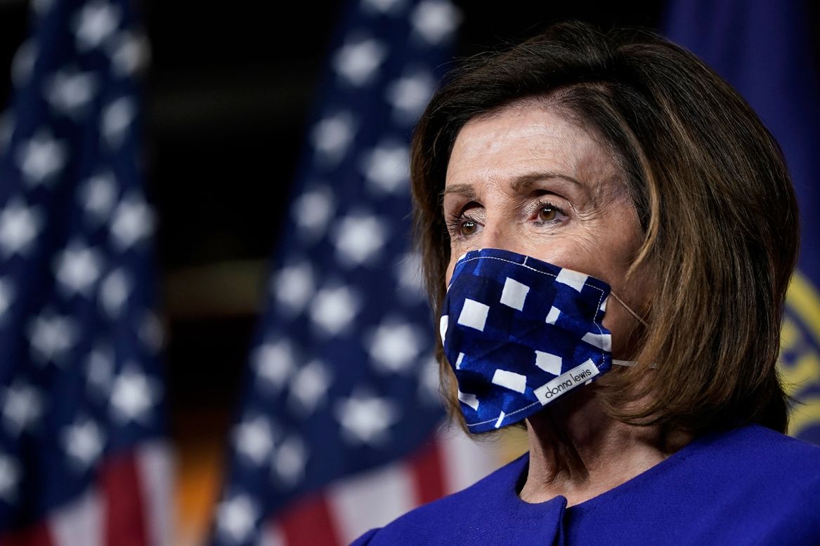 House Speaker Nancy Pelosi wears a face mask during a news conference at the US Capitol on Wednesday, April 29. She announced the Democratic members <a href="https://www.cnn.com/2020/04/29/politics/coronavirus-oversight-congress-members/index.html" target="_blank">who will serve on a newly established oversight panel</a> that has broad authority to oversee the federal response to the coronavirus pandemic.