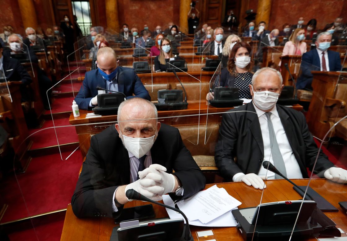Lawmakers wear face masks during a parliament session in Belgrade, Serbia, on Tuesday, April 28. It was the first time lawmakers had met since the coronavirus outbreak began.