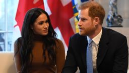 LONDON, UNITED KINGDOM - JANUARY 07: Prince Harry, Duke of Sussex and Meghan, Duchess of Sussex gesture during their visit to Canada House in thanks for the warm Canadian hospitality and support they received during their recent stay in Canada, on January 7, 2020 in London, England. (Photo by DANIEL LEAL-OLIVAS  - WPA Pool/Getty Images)