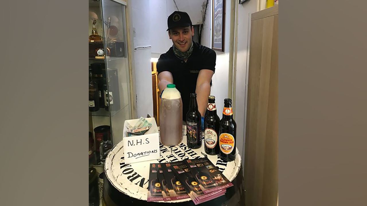 Brewer and manager Phil Bell prepares for a busy day of giving away free beers to locals.