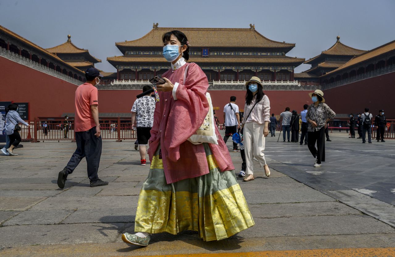 Tourists visit the Forbidden City in Beijing as it reopened to limited visitors on May 1.