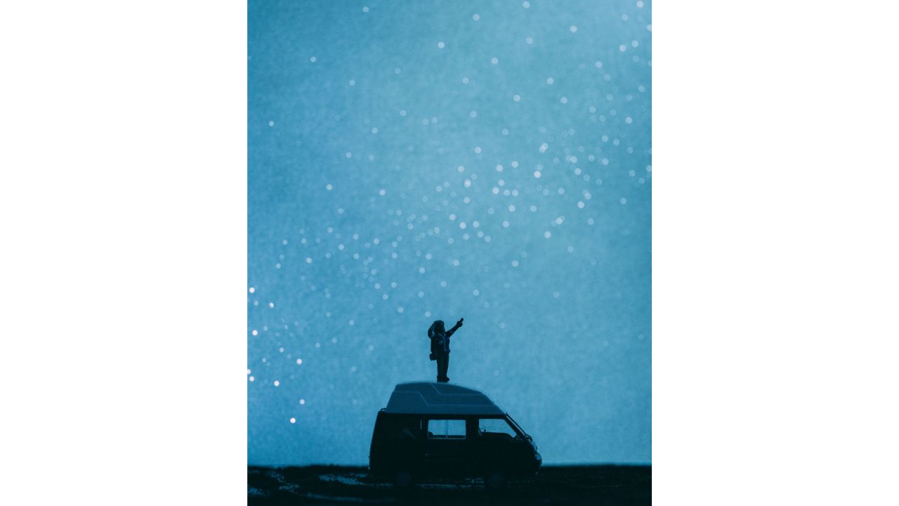 <strong>"Nightstand Astrophotography"</strong>: Sullivan placed a smart light bulb behind a piece of paper with holes poked in it to give the illusion of a sky full of stars.