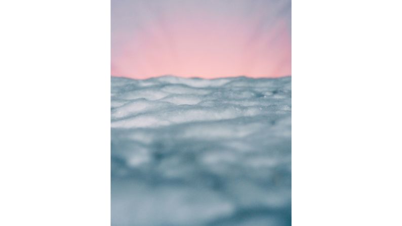 <strong>"Cotton Ball Clouds": </strong>An overhead view of a sunrise over clouds is made of cotton balls.