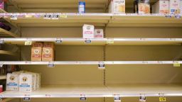 Shelves in the flour section are largely empty save for a few organic options at the Hannaford supermarket in Scarborough on Friday, March 27, 2020.