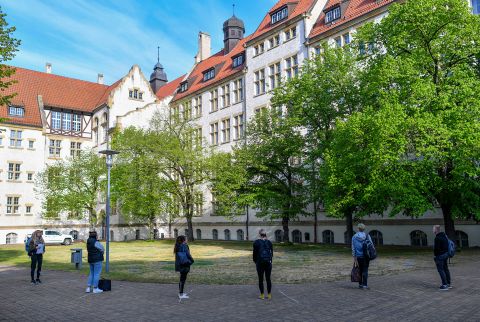 Students keep their distance from one another as they wait to take their Abitur exams in Frankfurt, Germany, on April 30.