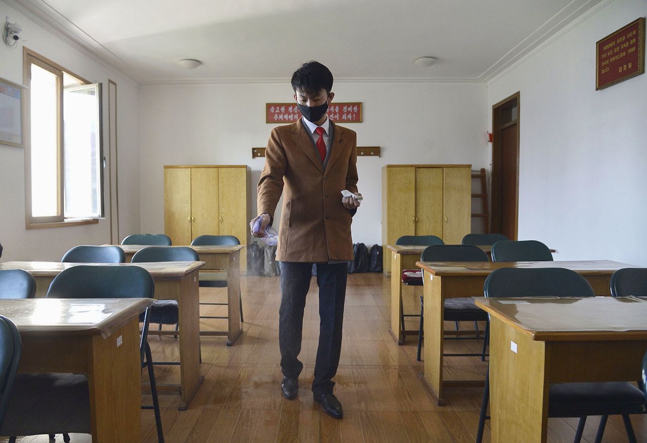 A student disinfects a classroom at the Pyongyang University of Foreign Studies in Pyongyang, North Korea, on April 22.