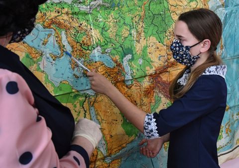 A girl wears a protective face mask during class in Nezhino, Russia, on April 16.