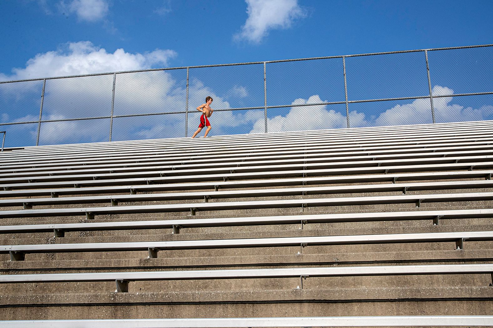 High school freshman Zane Menendez trains alone in Orlando on April 8.