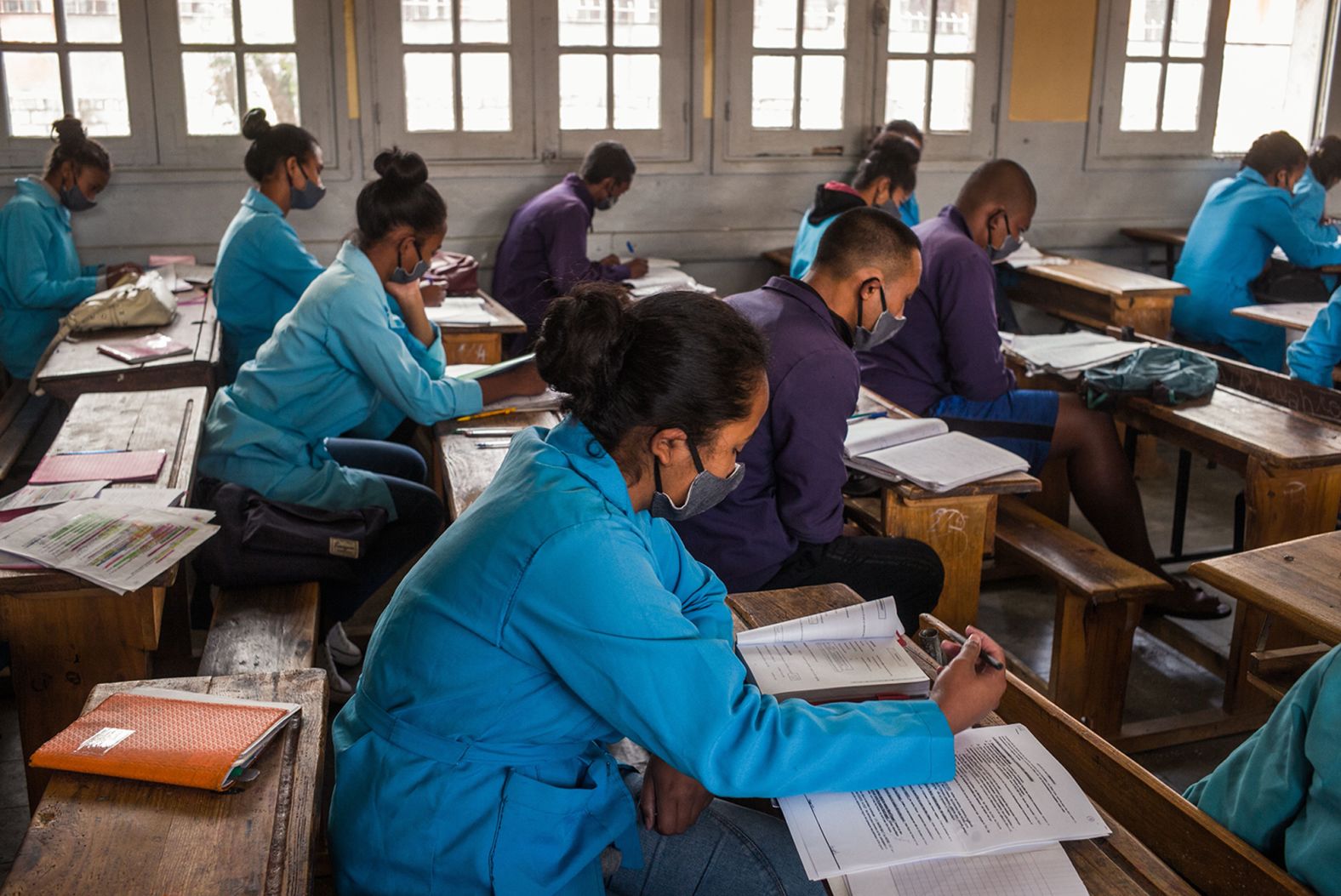 Students wear protective face masks on April 22 as they study at J.J. Rabearivelo High School in Antananarivo, Madagascar.