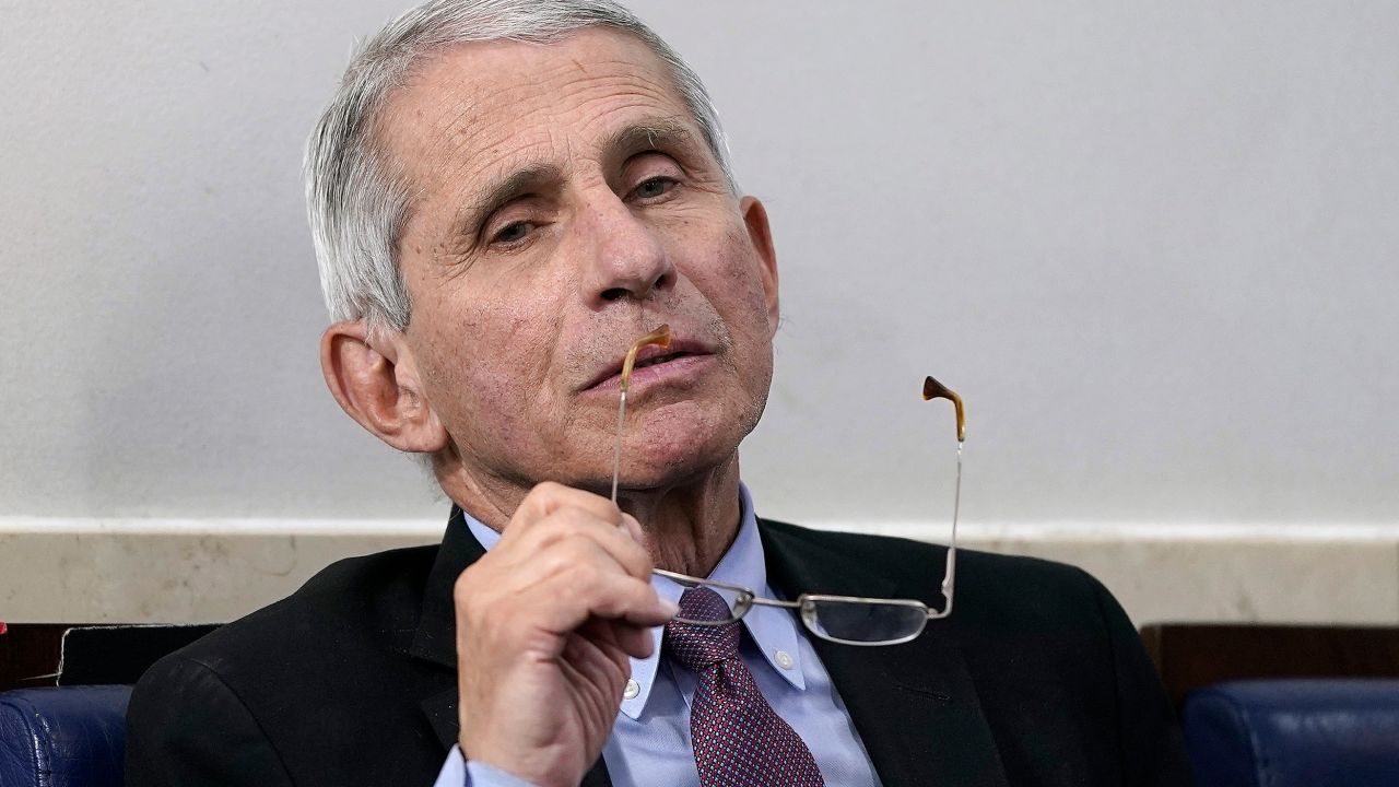 WASHINGTON, DC - APRIL 22: Dr. Anthony Fauci (R), director of the National Institute of Allergy and Infectious Diseases, participates in the daily coronavirus task force briefing at the White House on April 22, 2020 in Washington, DC. Dr. Robert Redfield, director of the Centers for Disease Control, has said that a potential second wave of coronavirus later this year could flare up again and coincide with flu season. (Photo by Drew Angerer/Getty Images)