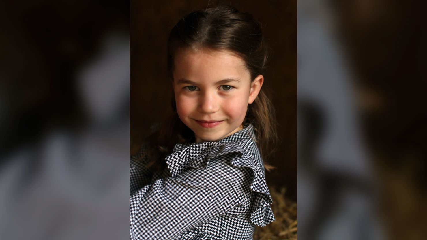 In this undated handout photo released by Kensington Palace, Britain's Princess Charlotte helps to deliver food packages for isolated pensioners in the local area along with her family, on the Sandringham Estate in King's Lynn, England. Princess Charlotte celebrates her fifth birthday on Saturday, May 2, 2020.