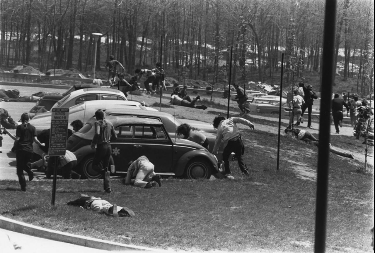 Students run for cover after the National Guard opened fire. Twenty-eight guardsmen fired into the crowd for 13 seconds, wounding nine students and killing 4.