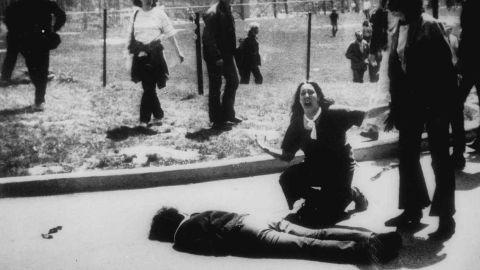 Mary Ann Vecchio gestures and screams as she kneels by the body of a student lying face down on the campus of Kent State University on May 4, 1970. 