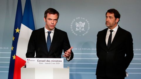French Health Minister Olivier Veran, left, said a proposal to extend his country's emergency measures would go before lawmakers Tuesday.