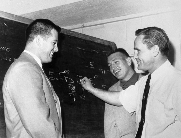 Shula draws up a play for Detroit's Terry Barr, left, and Baltimore's Johnny Unitas at a Pro Bowl meeting in 1965.