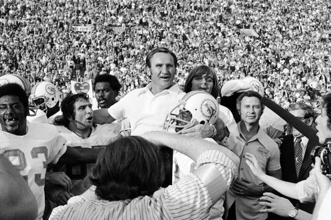Shula is carried off the field after the Dolphins won Super Bowl VII, capping a perfect season.
