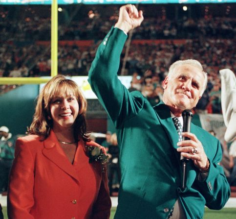 Shula is joined by his wife, Mary Anne, after receiving his Hall of Fame ring in Miami in 1997.