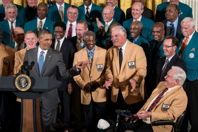 President Barack Obama points to Shula as the 1972 Dolphins were recognized at the White House in 2013. "I did have to explain to my staff, who mostly are in their early 30s, what an incredible impact these guys had, including on me, when they were playing," Obama said. "These Dolphins made history back before Super Bowl champs started visiting the White House."