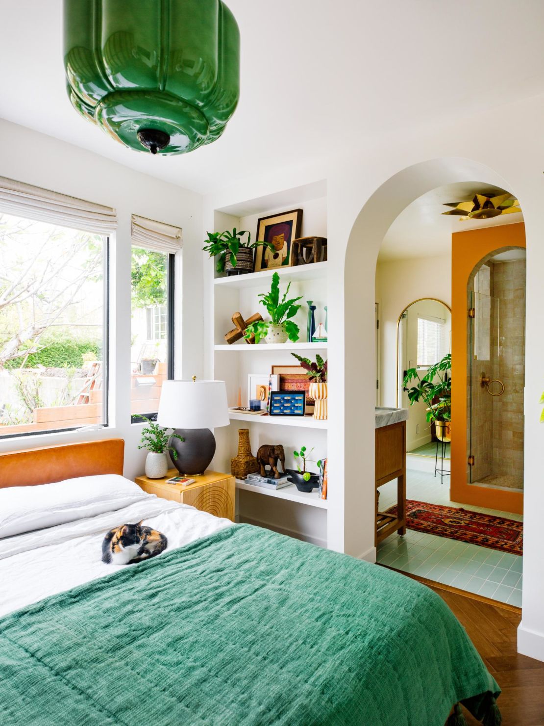 Green tones and plants can bring the outdoors inside.