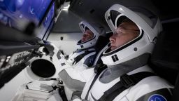NASA astronauts Bob Behnken and Doug Hurley in SpaceX's flight simulator for the Crew Dragon launch.