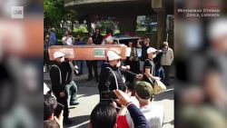 lebanese protesters currency funeral orig_00005111.jpg