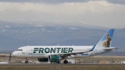 A Frontier Arilines jetliner taxis to a runway to take off from Denver International Airport Thursday, April 23, 2020, in Denver. (AP Photo/David Zalubowski)