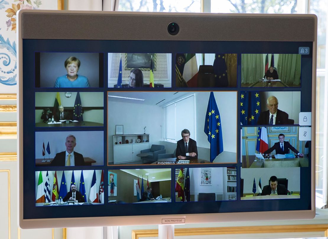 A picture shows a screen of a video conference call between members of the European Council, seen at the Elysee Palace in Paris, on March 26, 2020, to discuss coordination of EU efforts to tackle the outbreak of covid-19.