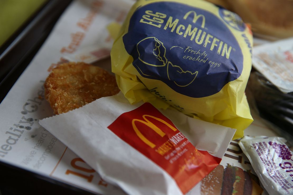 Hash browns nestle alongside an Egg McMuffin at a McDonald's restaurant in Fairfield, California.  