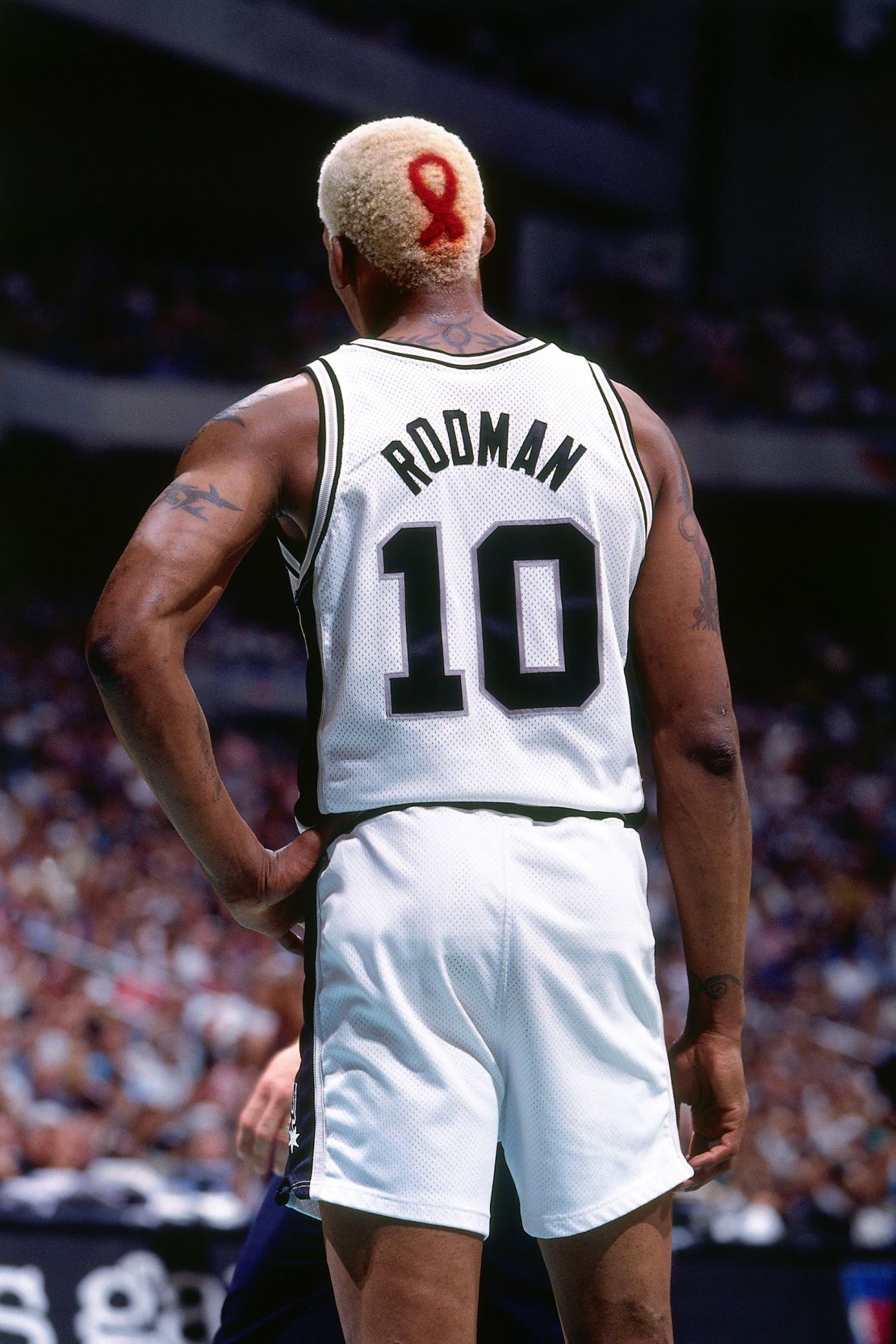 Dennis Rodman wore an HIV/AIDS awareness ribbon emblazoned on his head in 1995