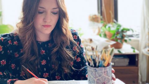Emily Rose Asher is the owner and designer of Emily Rose Ink, a calligraphy and wedding paper goods company.