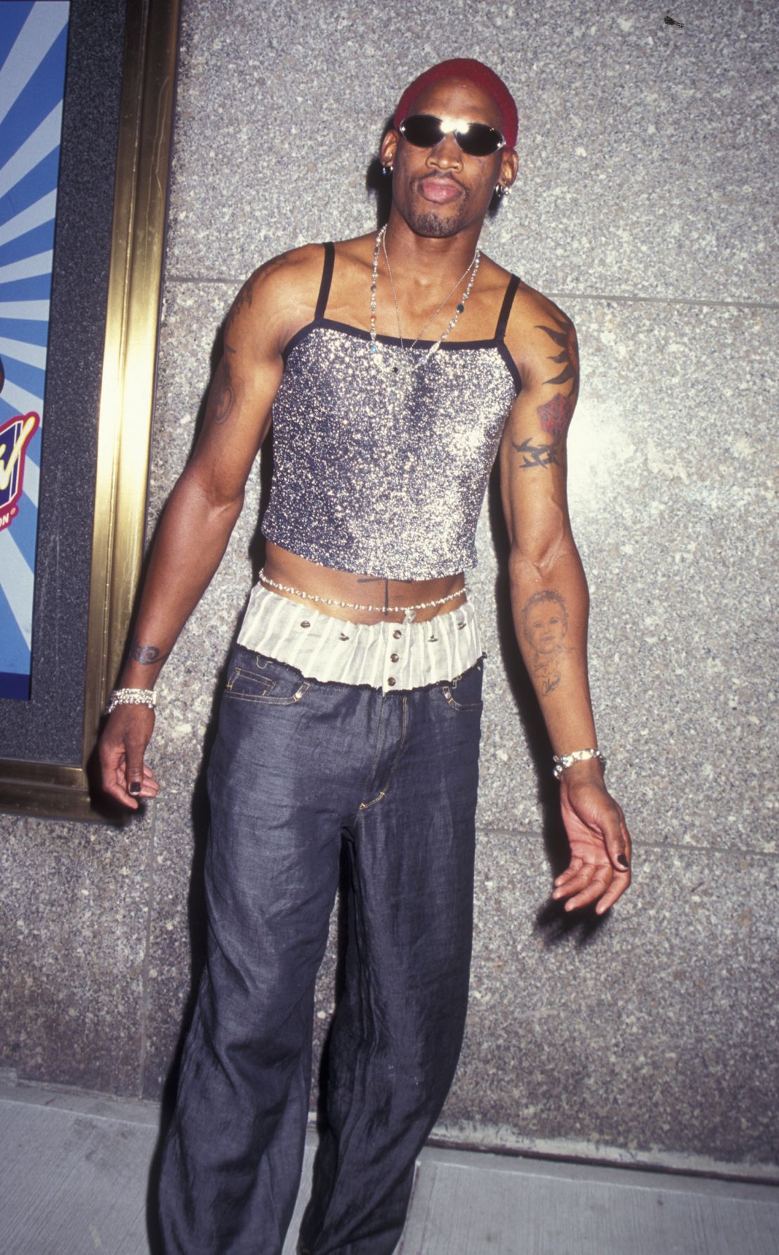 Dennis Rodman wore a sparkly top to the 12th Annual MTV Video Music Awards.