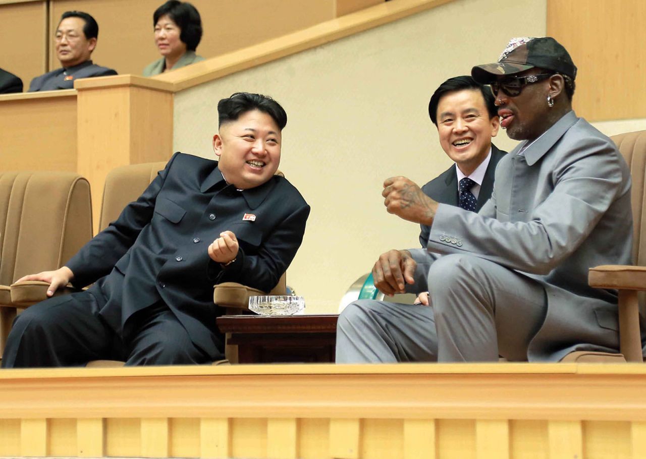 Dennis Rodman talks with North Korean leader Kim Jong Un at an exhibition game in Pyongyang.