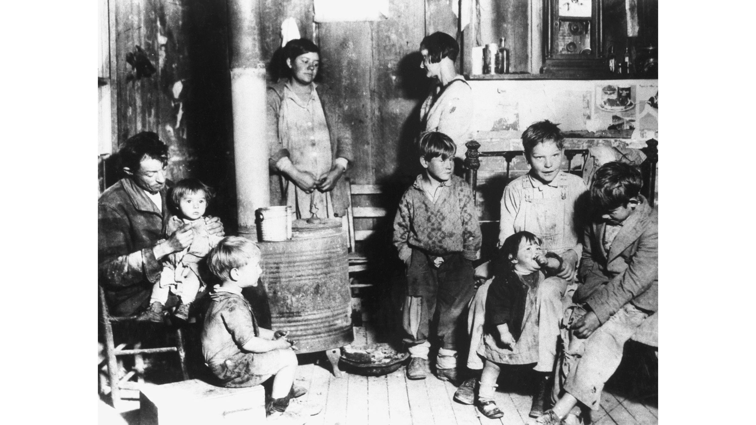 A destitute American couple at home with their seven children.