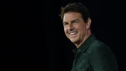 Actor Tom Cruise makes a surprise appearance in Hall H to promote Top Gun: Maverick  at the Convention Center during Comic Con in San Diego, California on July 18, 2019. (Photo by Chris Delmas / AFP)        (Photo credit should read CHRIS DELMAS/AFP via Getty Images)