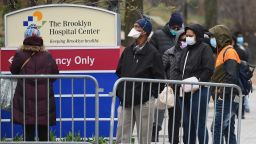 People who believe they have COVID-19, and who meet the criteria, wait in line to be pre-screened for the coronavirus outside of the Brooklyn Hospital Center on March 20, 2020 in the Brooklyn borough of New York. - The new coronavirus isn't picky about who it infects -- so why does data emerging from some states suggest that African Americans are bearing the brunt?
Experts say the community is disproportionately impacted by underlying conditions linked to poverty, and often faces challenges in accessing testing and health care (Photo by Angela Weiss / AFP) (Photo by ANGELA WEISS/AFP via Getty Images)
