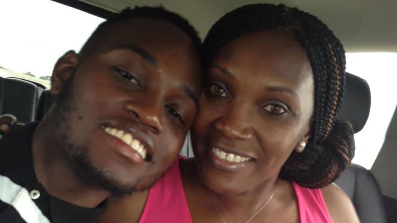 Arbery poses with his mother, Wanda Cooper, who is demanding answers.
