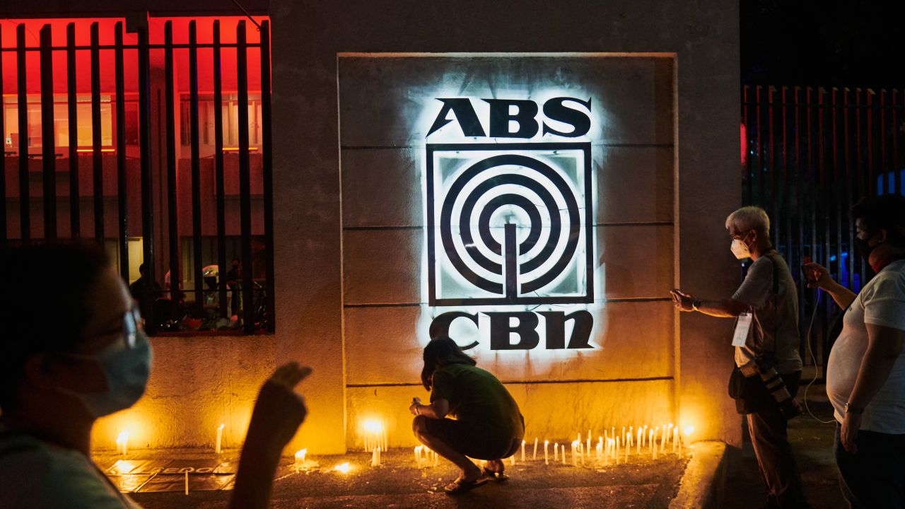 MANILA, PHILIPPINES - MAY 05:  Supporters and other media persons gather in fron of ABS-CBNs main office  on May 5, 2020 in Manila, Philippines. The Philippine government shuts down ABS-CBN, the countrys biggest and leading broadcaster that has been critical of president Rodrigo Duterte while the country is facing the threat of the coronavirus pandemic. More than 11,000 employees will be affected and millions of Filipinos  will lose their source of news and entertainment when people need crucial and timely information as the nation deals with the Covid-19 pandemic, the company said. (Photo by Jes Aznar/Getty Images)