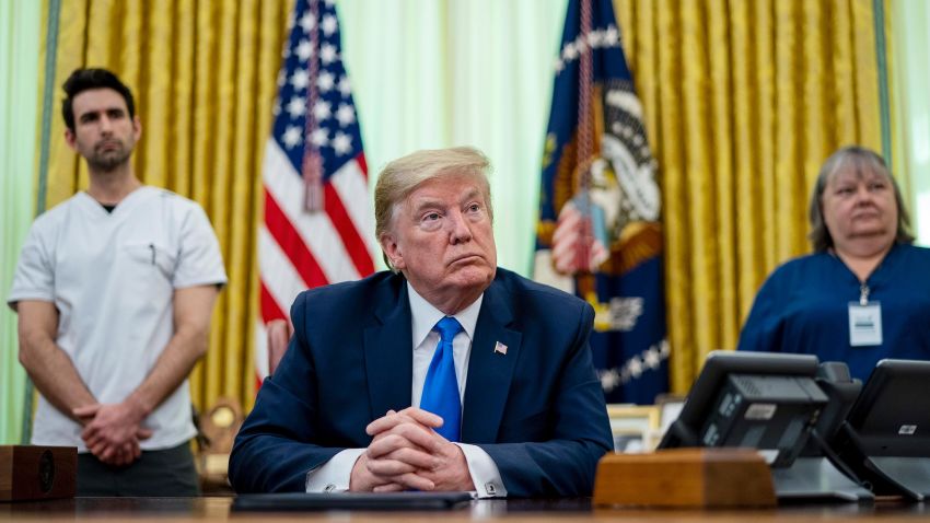 As the novel coronavirus pandemic continues in the United States, President Donald Trump talks to journalists after signing a proclamation honoring National Nurses Day in the Oval Office at the White House May 06, 2020 in Washington, DC. With more than a million people in the United States infected with COVID-19 and tens of thousands dead from the virus, nurses have been on the front lines of care for patients across the country.