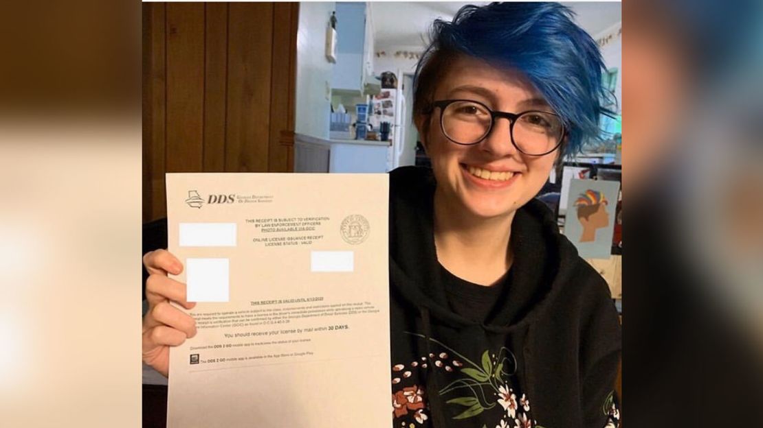Willa Pevey, 17, holding up a receipt of approval for her new drivers license that she applied for online without taking a road test. 