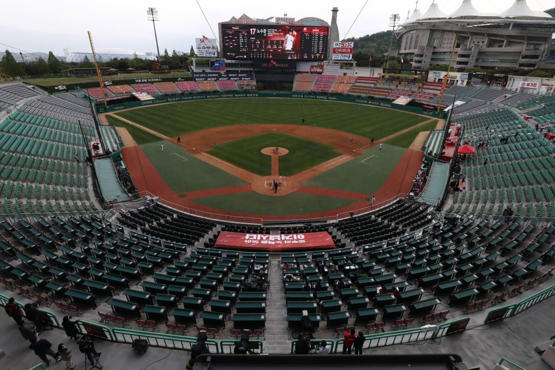 The SK Wyverns and the Hanwha Eagles play in an empty SK Happy Dream Ballpark on Tuesday, which was opening day for the Korean Baseball League.