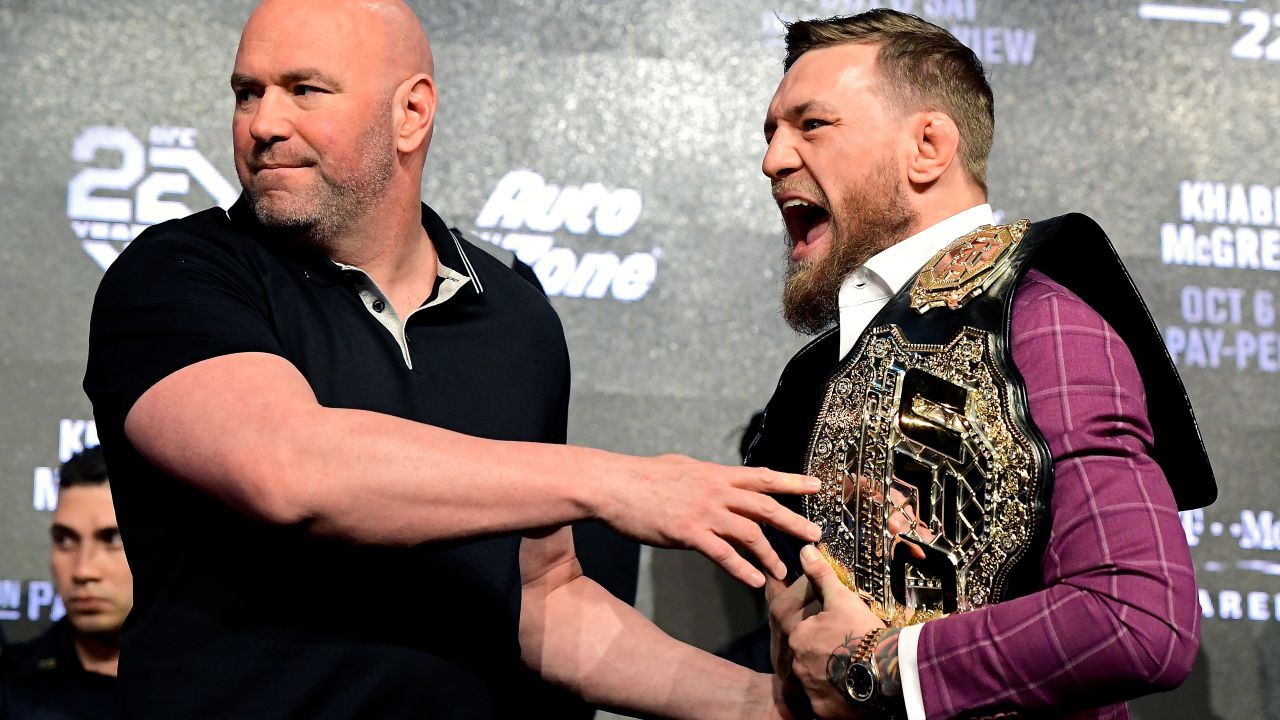 Conor McGregor is held back by UFC President Dana White during the UFC 229 Press Conference at Radio City Music Hall on September 20, 2018 in New York City.