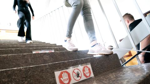 Signposting on stairs and in hallways help students in Ettlingen, Germany, keep their distance.