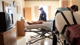 CHELSEA, UNITED STATES - APRIL 23: A Cataldo EMS team picks up a suspected Covid-19 patient at Eastpointe Rehabilitation, a nursing home, April 23, 2020 in Chelsea, Massachusetts United States. EMTs and Paramedics for Cataldo Ambulance work during the surge of Covid-19 cases transporting suspected Covid-19 patients and other patients. (Photo by David Degner/Getty Images).