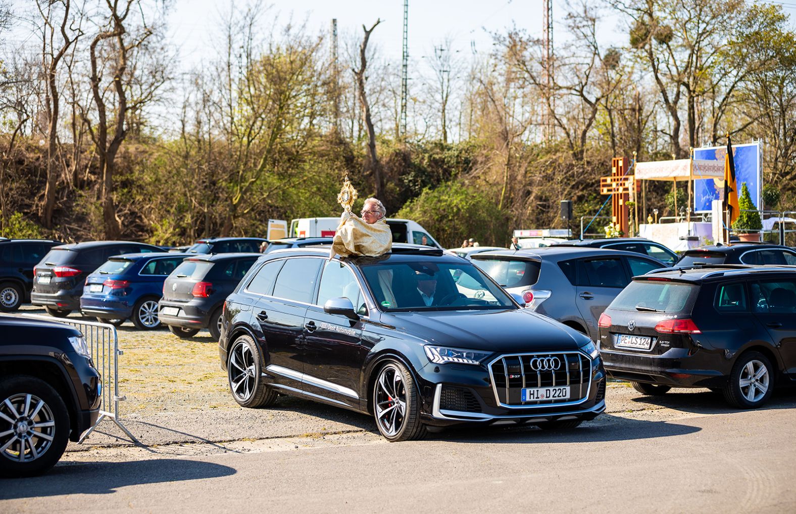 Pastor Hans-Günter Sorge holds the monstrance during a drive-in Easter service in Hildesheim, Germany, on April 12.