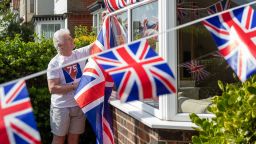 07 May, 2020 Pageantmaster of VE Day 75 Bruno Peek, decorates his house in Gorleston-on-Sea, Norfolk, with flags and bunting to mark the 75th anniversary of the end of the Second World War in Europe. (Photo by Joe Giddens/PA Images via Getty Images)